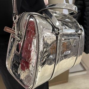 MICHAEL KORS Jet Set Medium Patent Logo Debossed Duffel Crossbody Bag
Silver